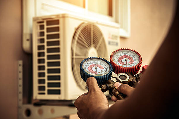 Professional Air Conditioning Service technician working in Brentwood, PA